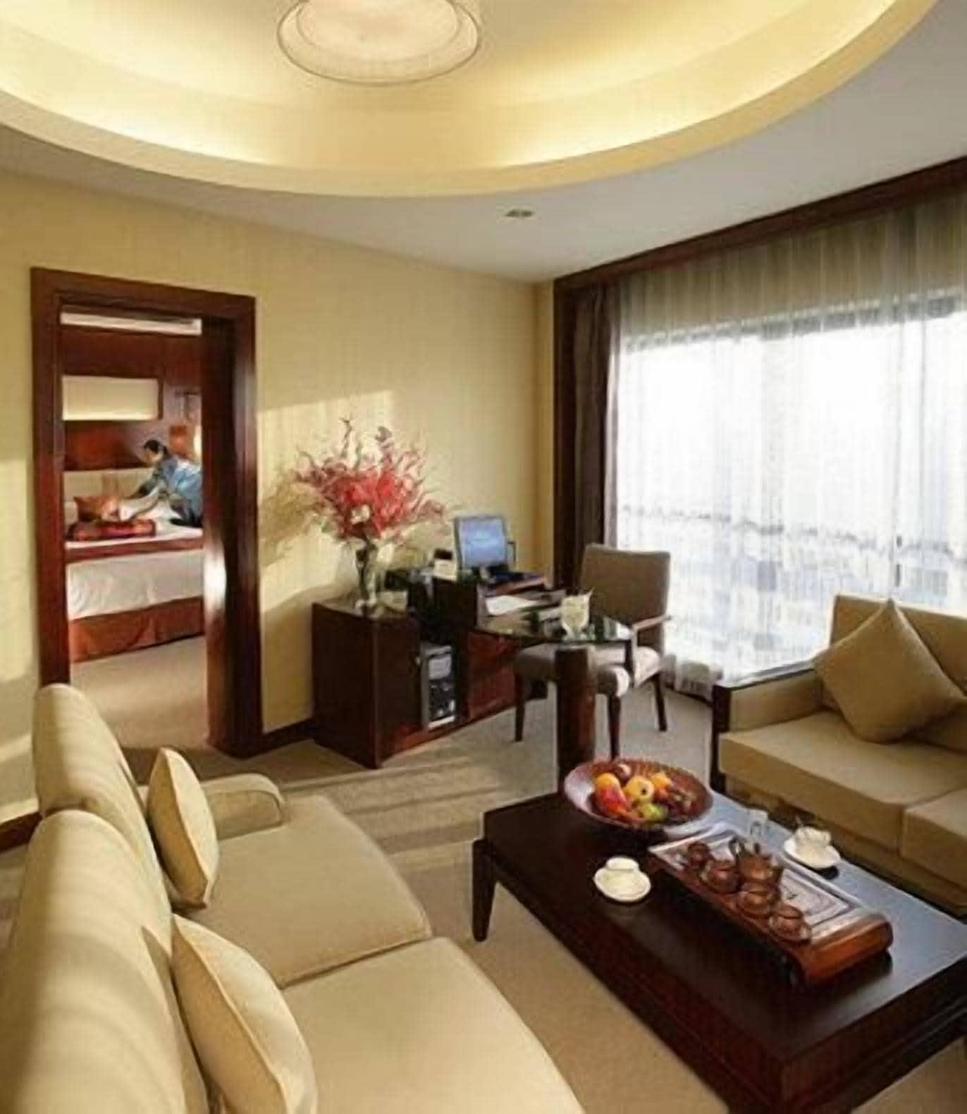 Yiwu Ocean Hotel - Original Best Western Premier Ocean Hotel Rum bild